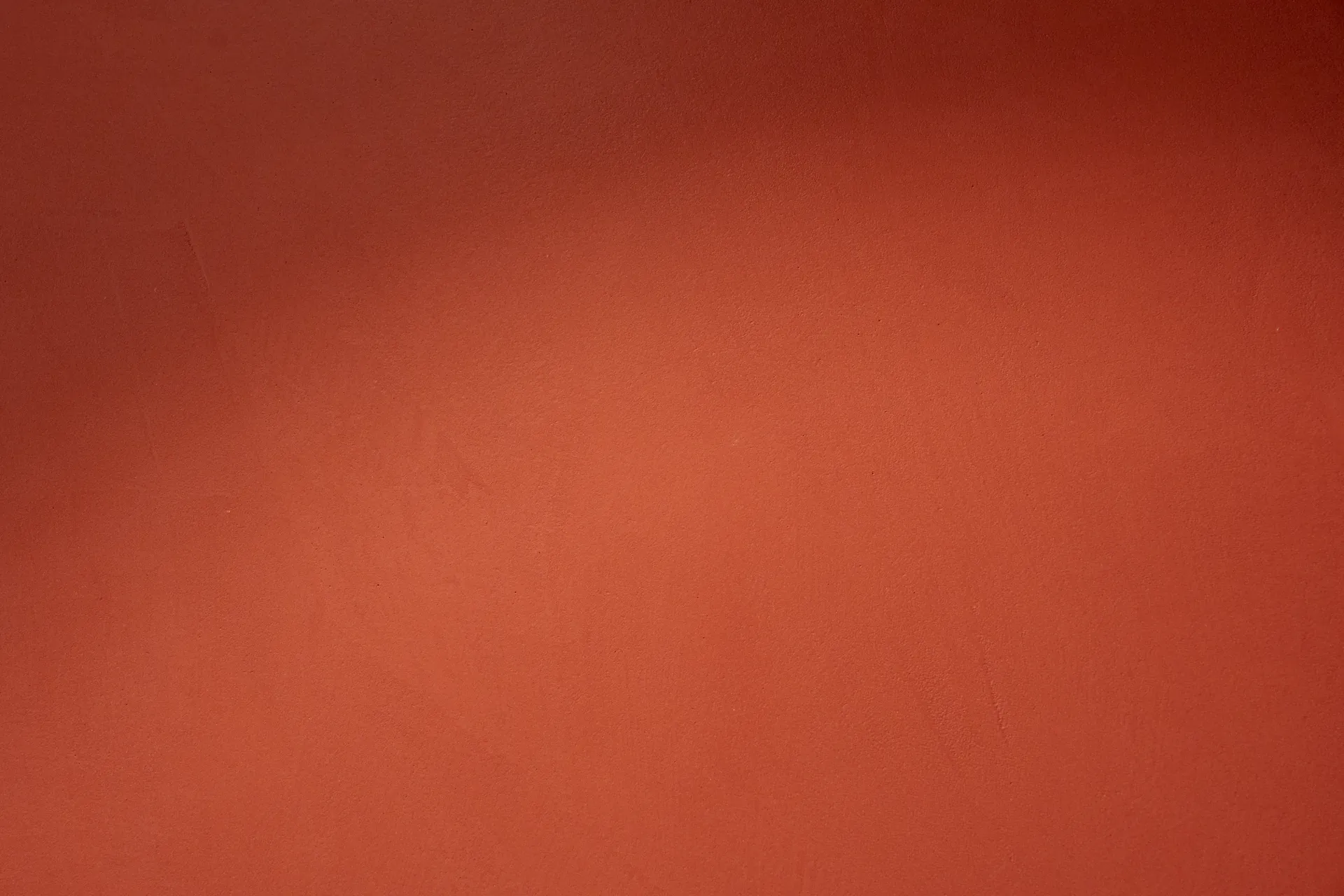 Surface béton ciré terracotta uniforme